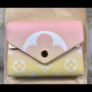 Louis Vuitton by the pool wallet, pink